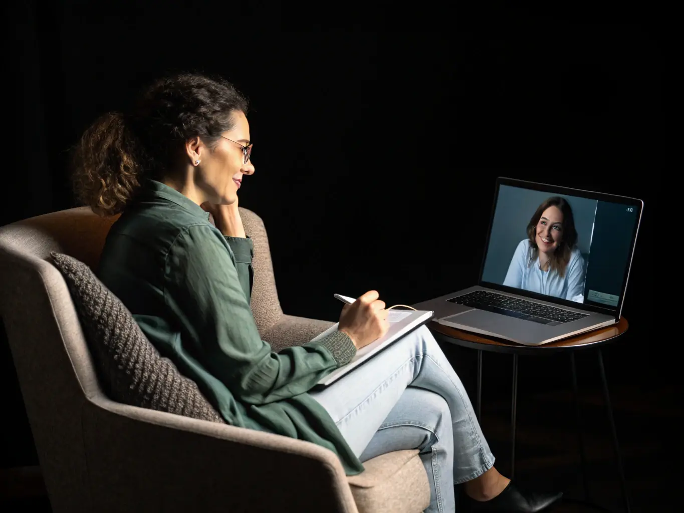 A professional therapist conducting a virtual therapy session with a client, both engaged in a meaningful conversation, showcasing the high-quality virtual sessions offered by Mind Align Health.